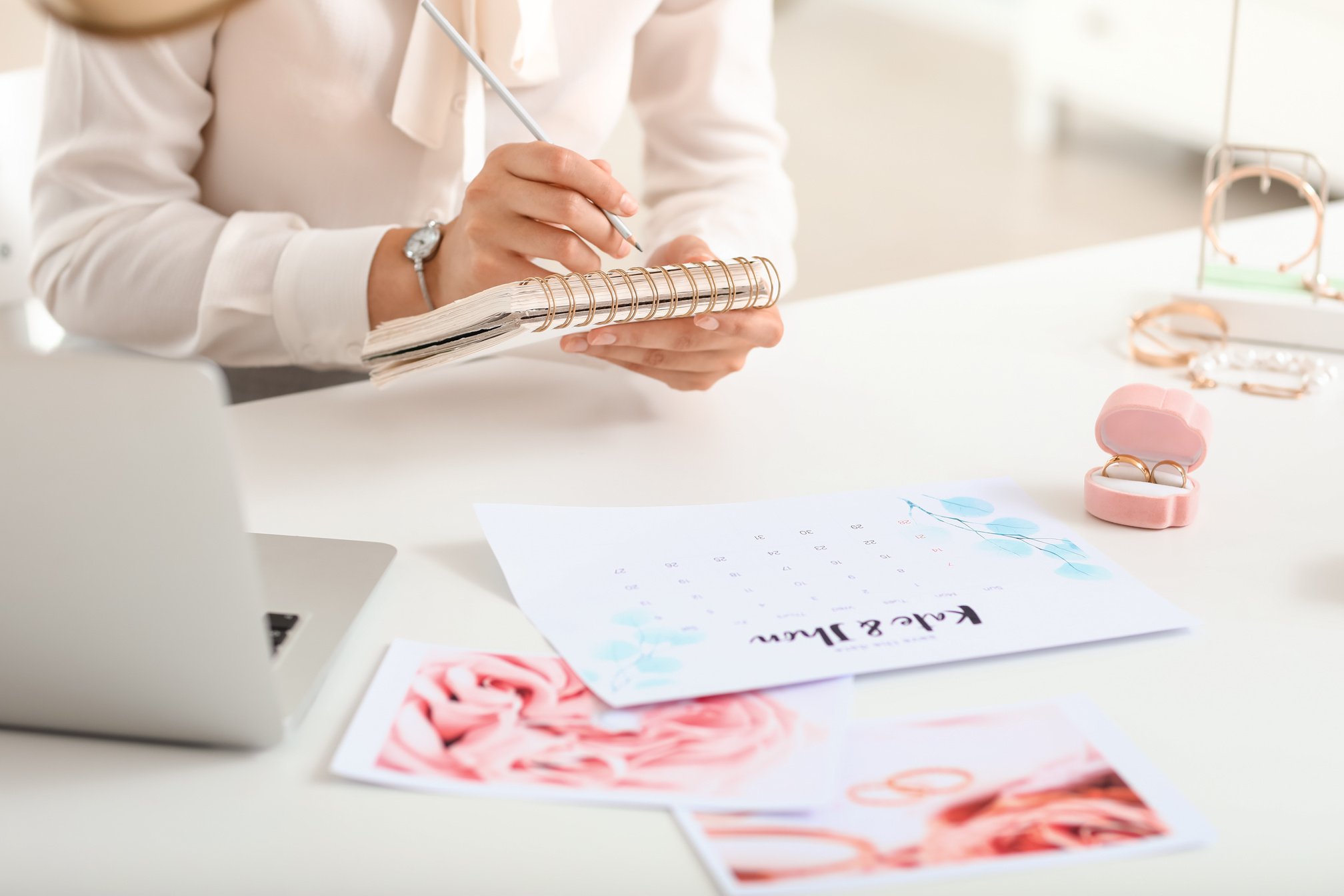 Female Wedding Planner Working in Office